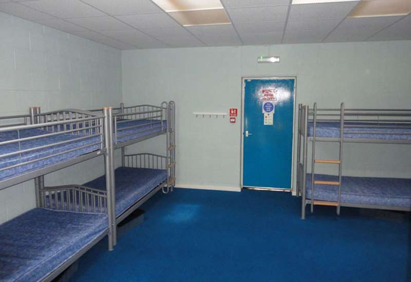 Dormitory with bunk beds inside Badgers Lodge